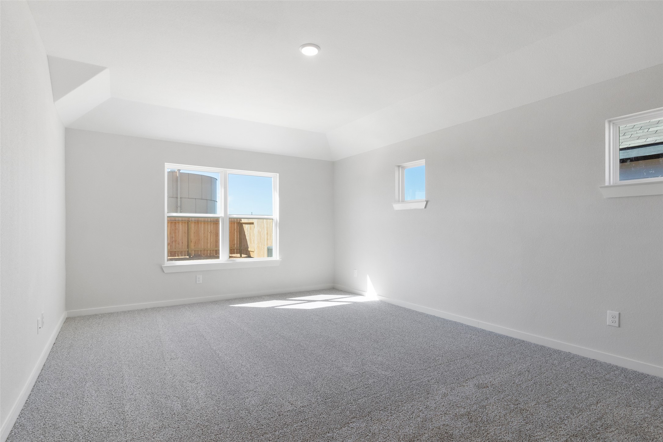 11811 Stratosphere Street Conroe, TX 77303 - Photo 12 of 13 an empty room with a window
