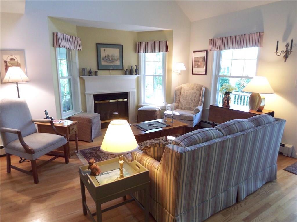 9 Captains Walk, Unit 17 Wells, ME 04090 - Photo 4 of 18 Gleaming hardwood floors flow...