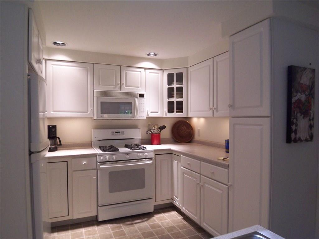 9 Captains Walk, Unit 17 Wells, ME 04090 - Photo 7 of 18 A spacious and efficient kitchen is...