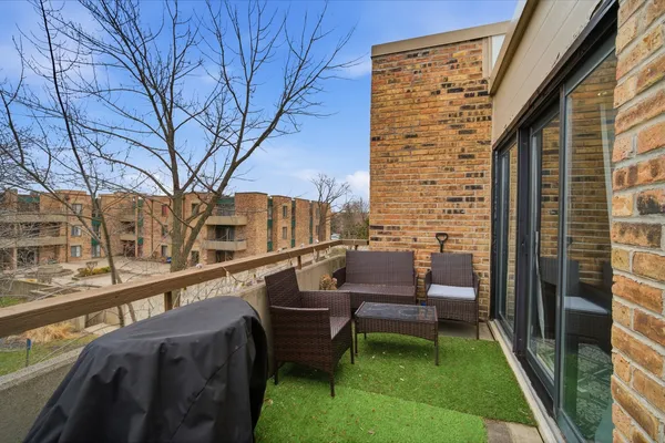 a balcony with furniture