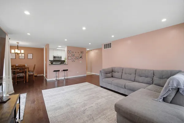 a living room with furniture and a table