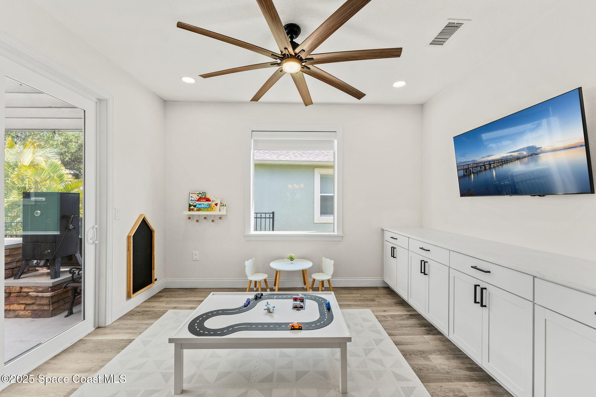 5824 Trieda Drive Melbourne, FL 32940 - Photo 16 of 45 a bathroom with a sink a mirror and a shower