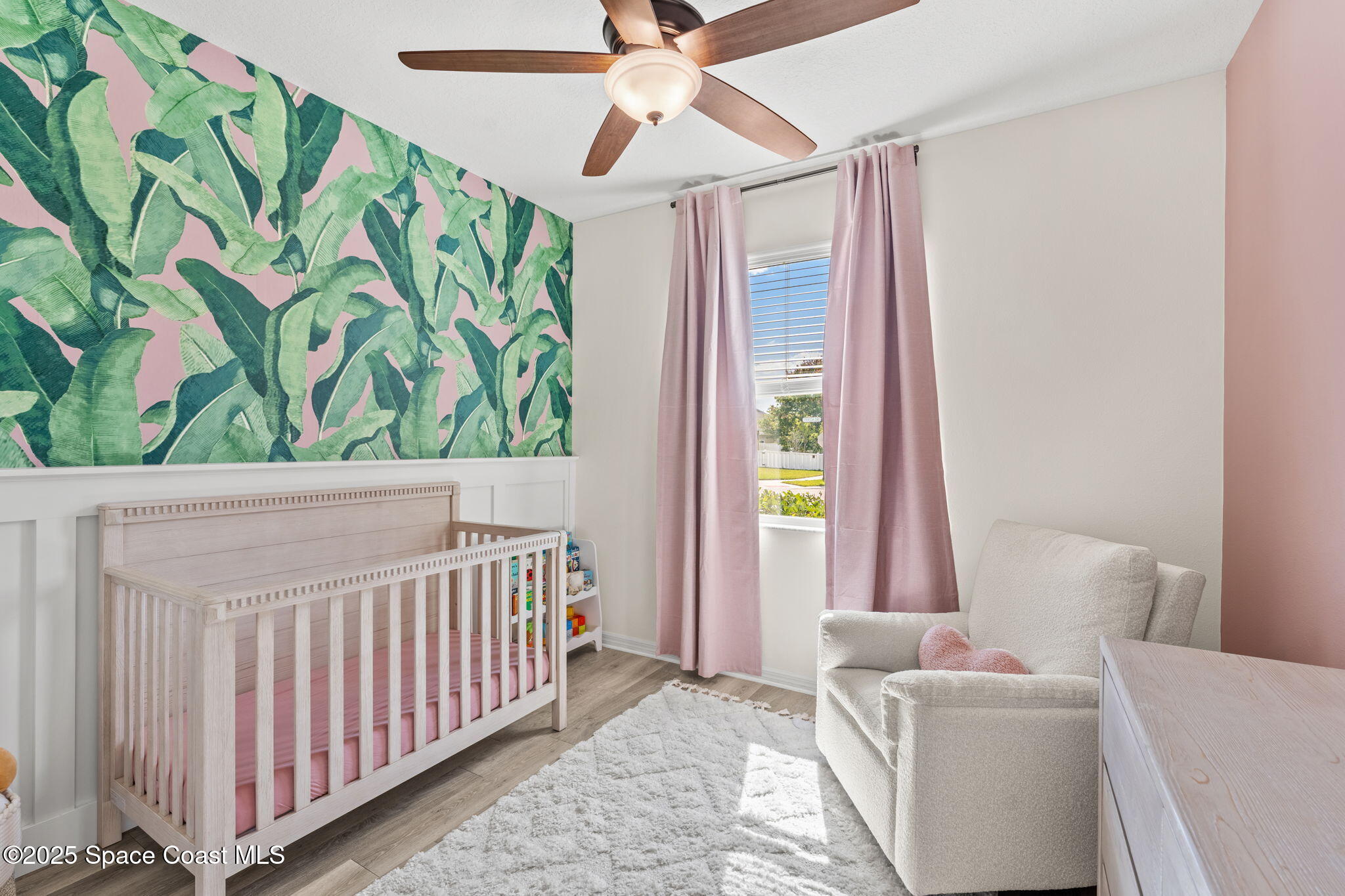 5824 Trieda Drive Melbourne, FL 32940 - Photo 20 of 45 a bedroom with furniture and a window