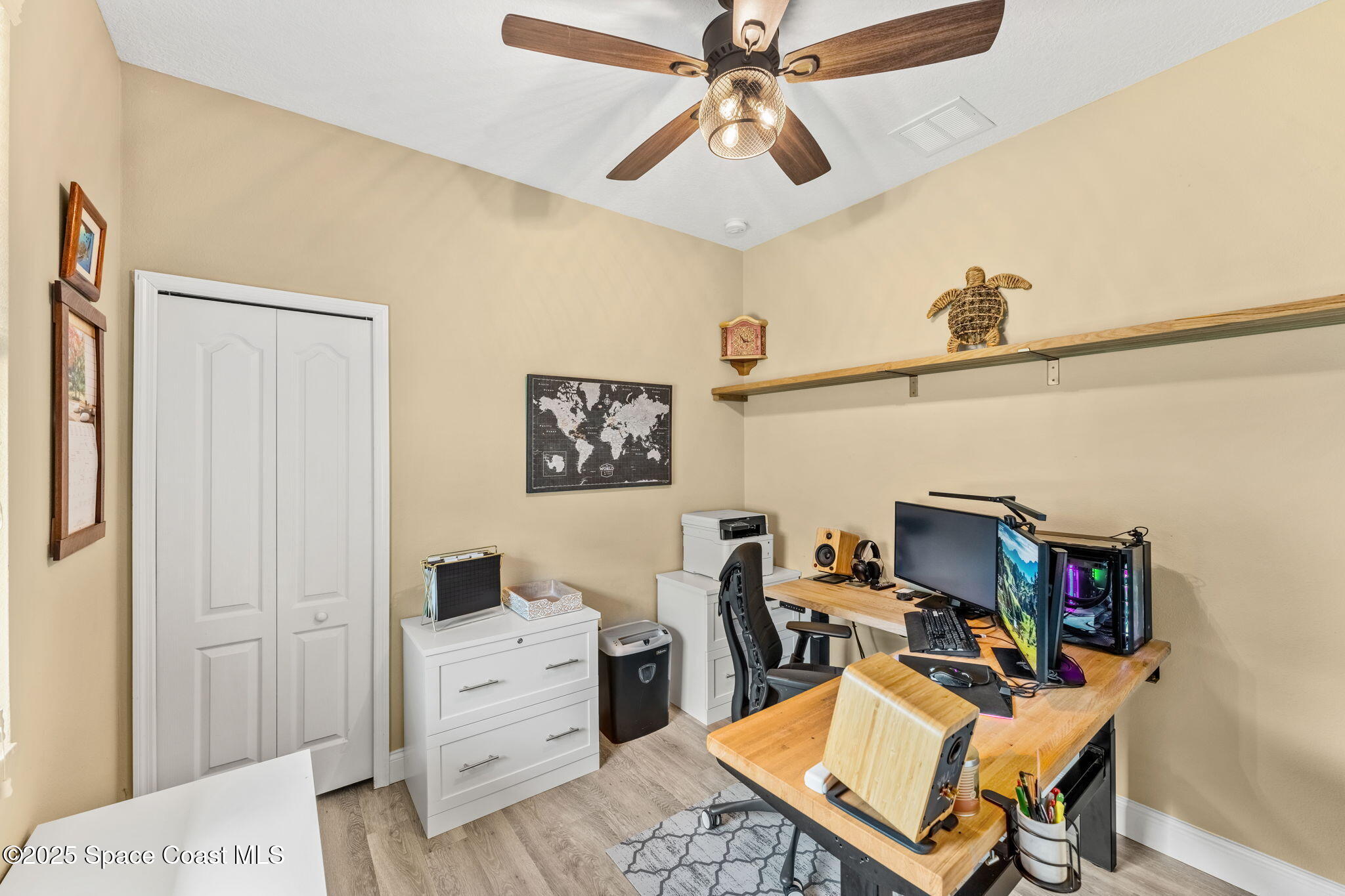 5824 Trieda Drive Melbourne, FL 32940 - Photo 23 of 45 a workspace with furniture and a window