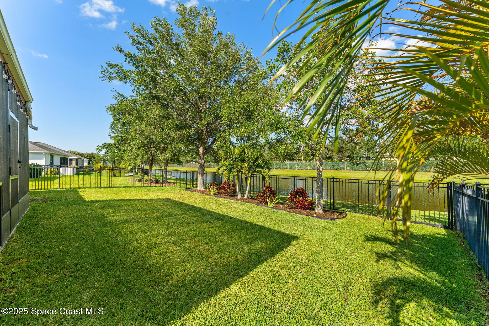 5824 Trieda Drive Melbourne, FL 32940 - Photo 30 of 45 a view of a park with large trees