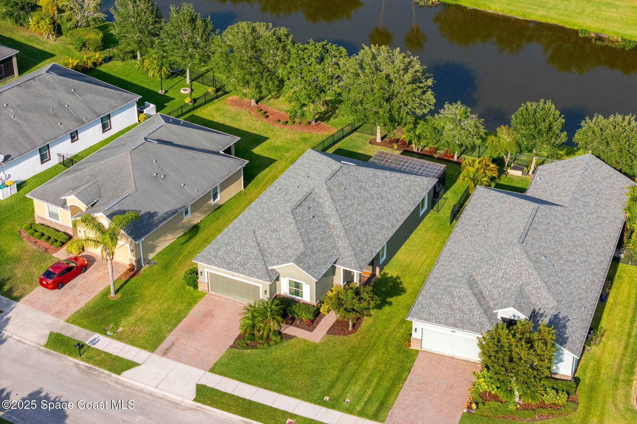 5824 Trieda Drive Melbourne, FL 32940 - Photo 34 of 45 an aerial view of a house