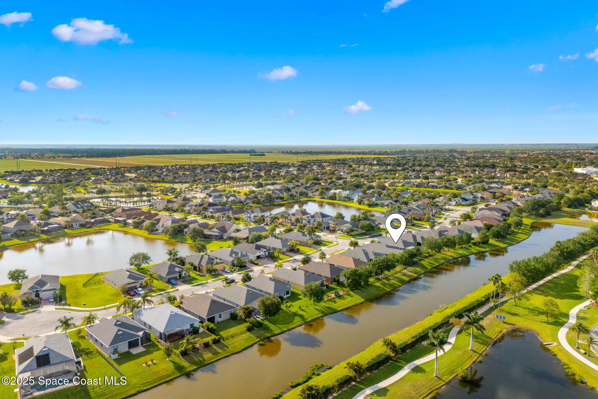 5824 Trieda Drive Melbourne, FL 32940 - Photo 35 of 45 an aerial view of residential houses with outdoor space