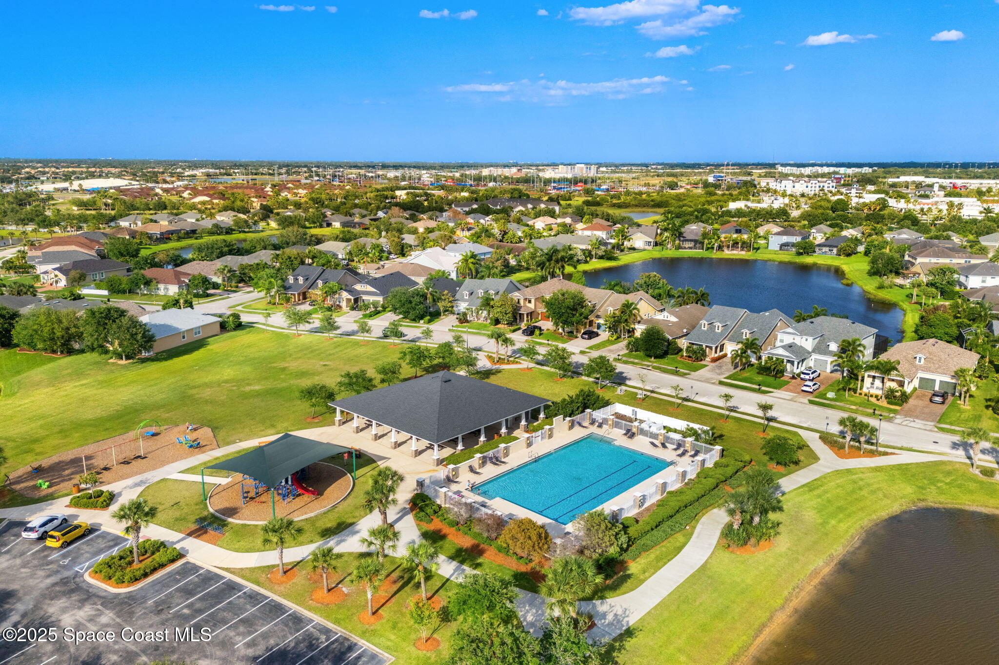 5824 Trieda Drive Melbourne, FL 32940 - Photo 43 of 45 an aerial view of residential houses with outdoor space