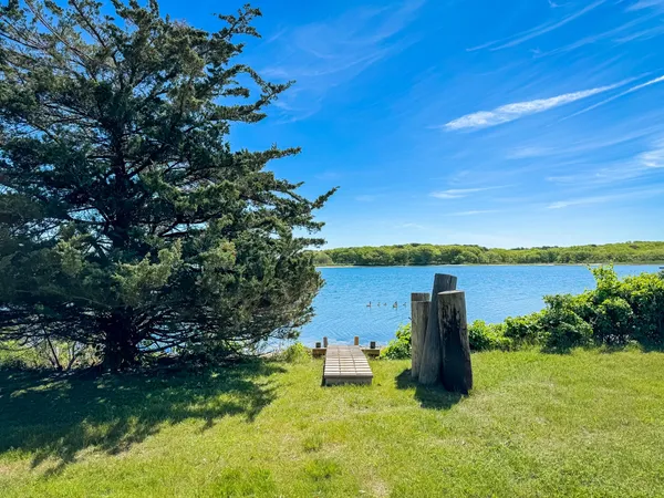 a view of a lake with a building in the background