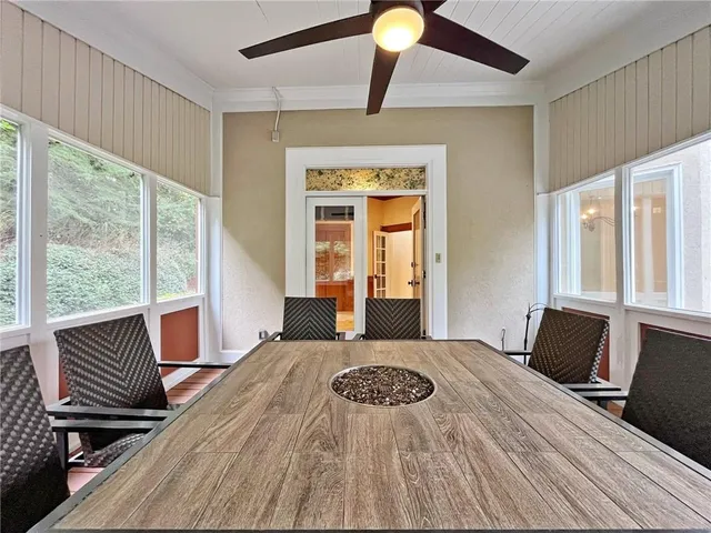 a bathroom with a granite countertop sink a vanity and mirror