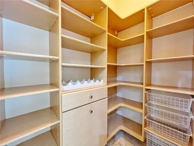 a view of a hallway view with staircase