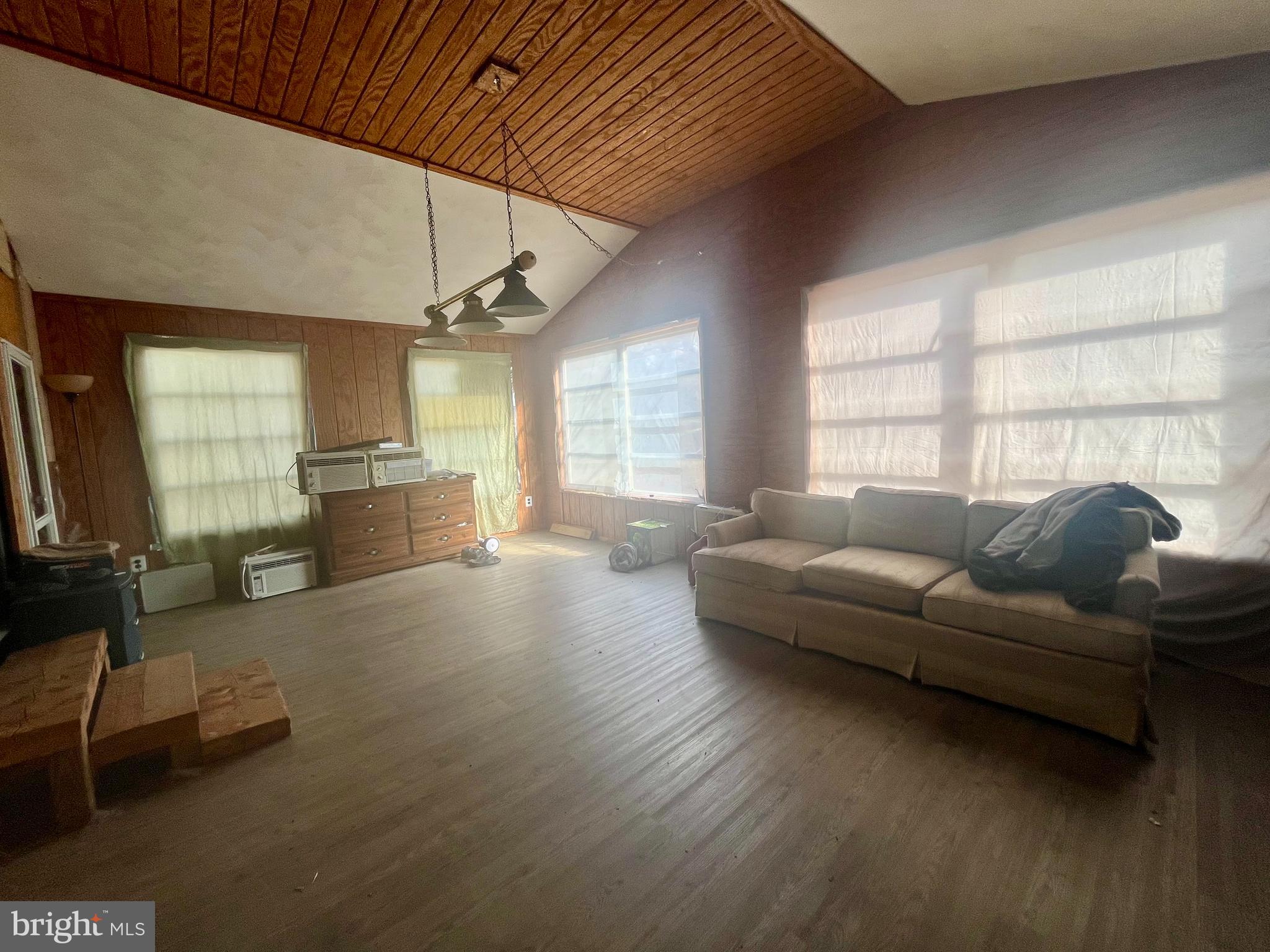 305 Rickard Place Rileyville, VA 22650 - Photo 12 of 27 a living room with furniture window and wooden floor