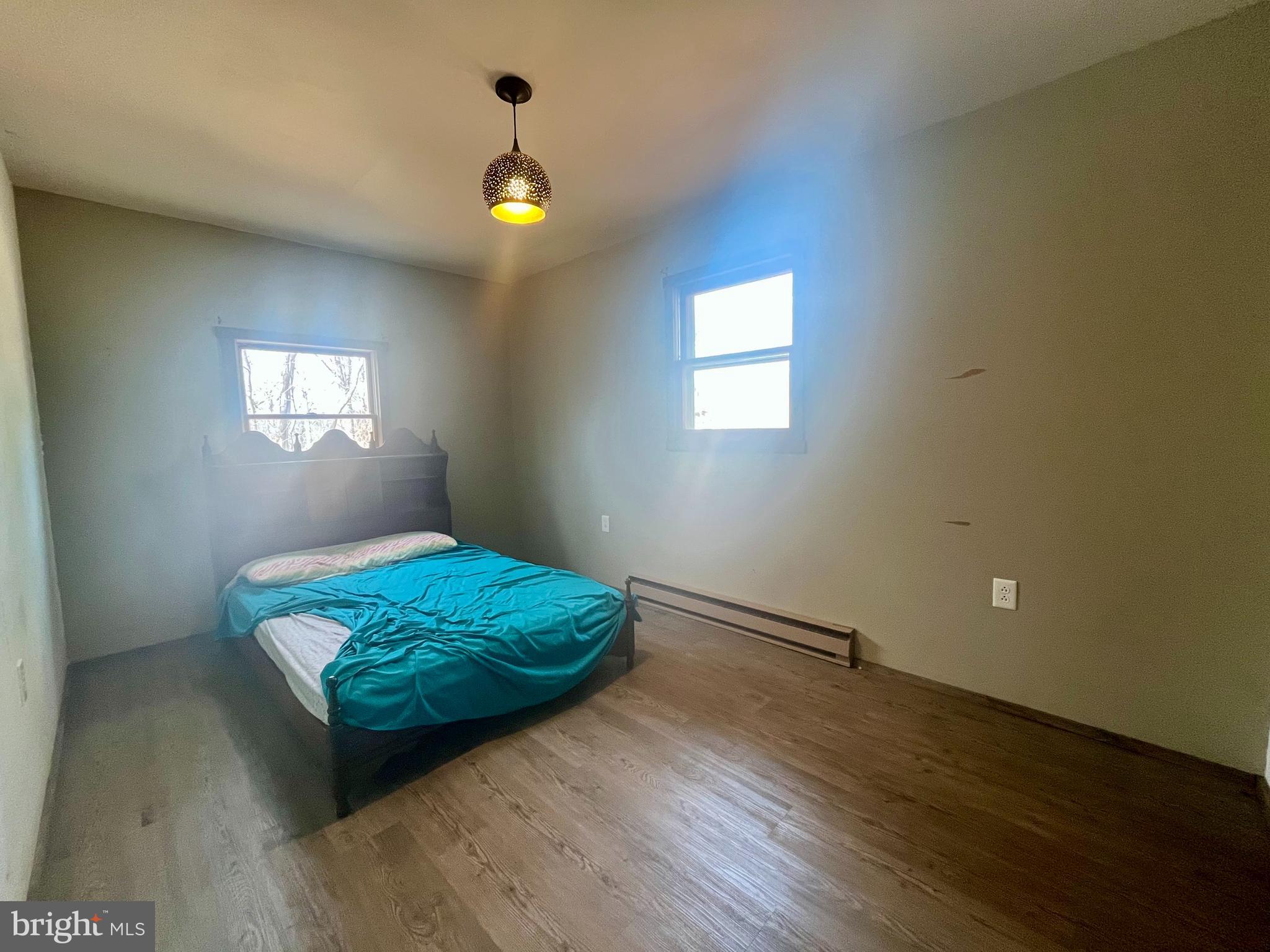 305 Rickard Place Rileyville, VA 22650 - Photo 13 of 27 a living room with hard wood floors and a window