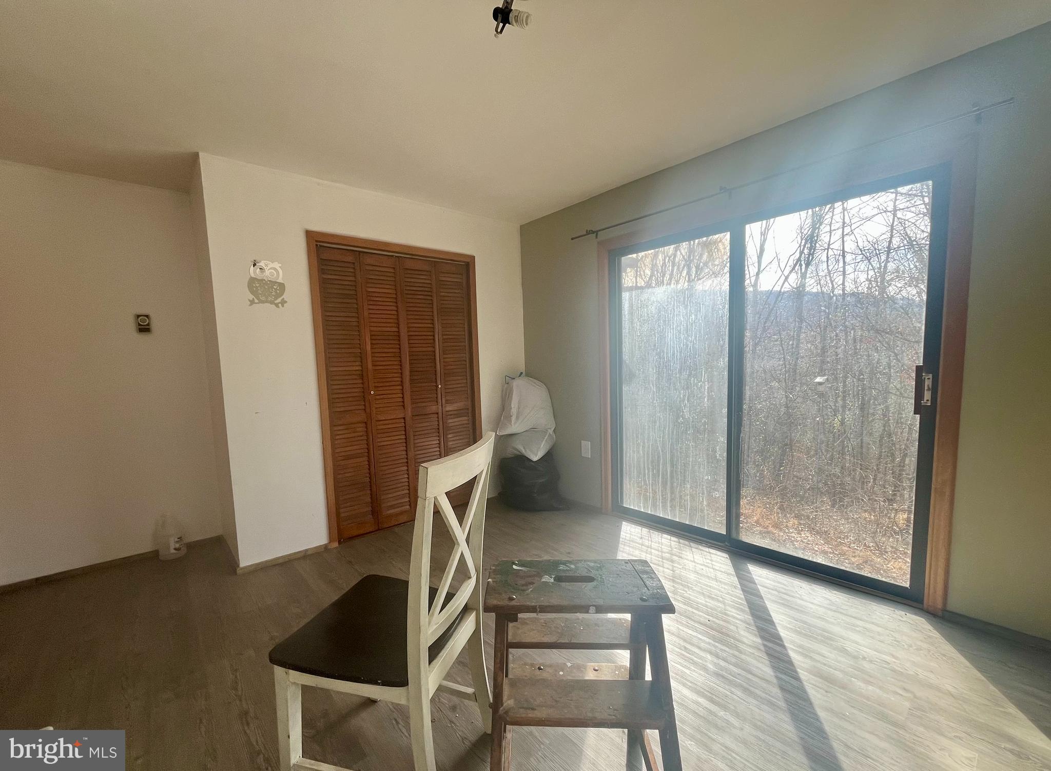 305 Rickard Place Rileyville, VA 22650 - Photo 17 of 27 a workspace with wooden floor and windows
