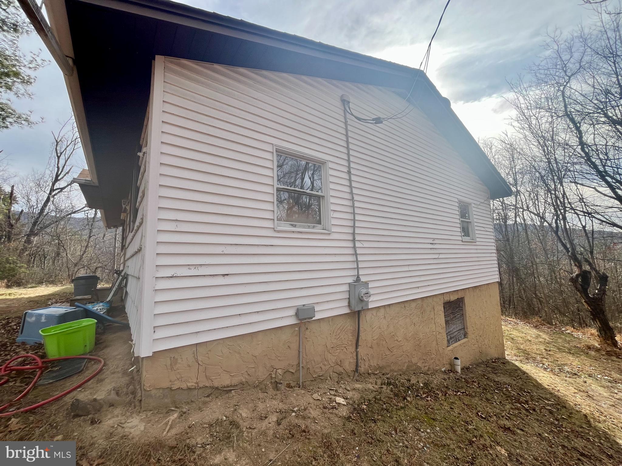 305 Rickard Place Rileyville, VA 22650 - Photo 23 of 27 a view of a house with a yard