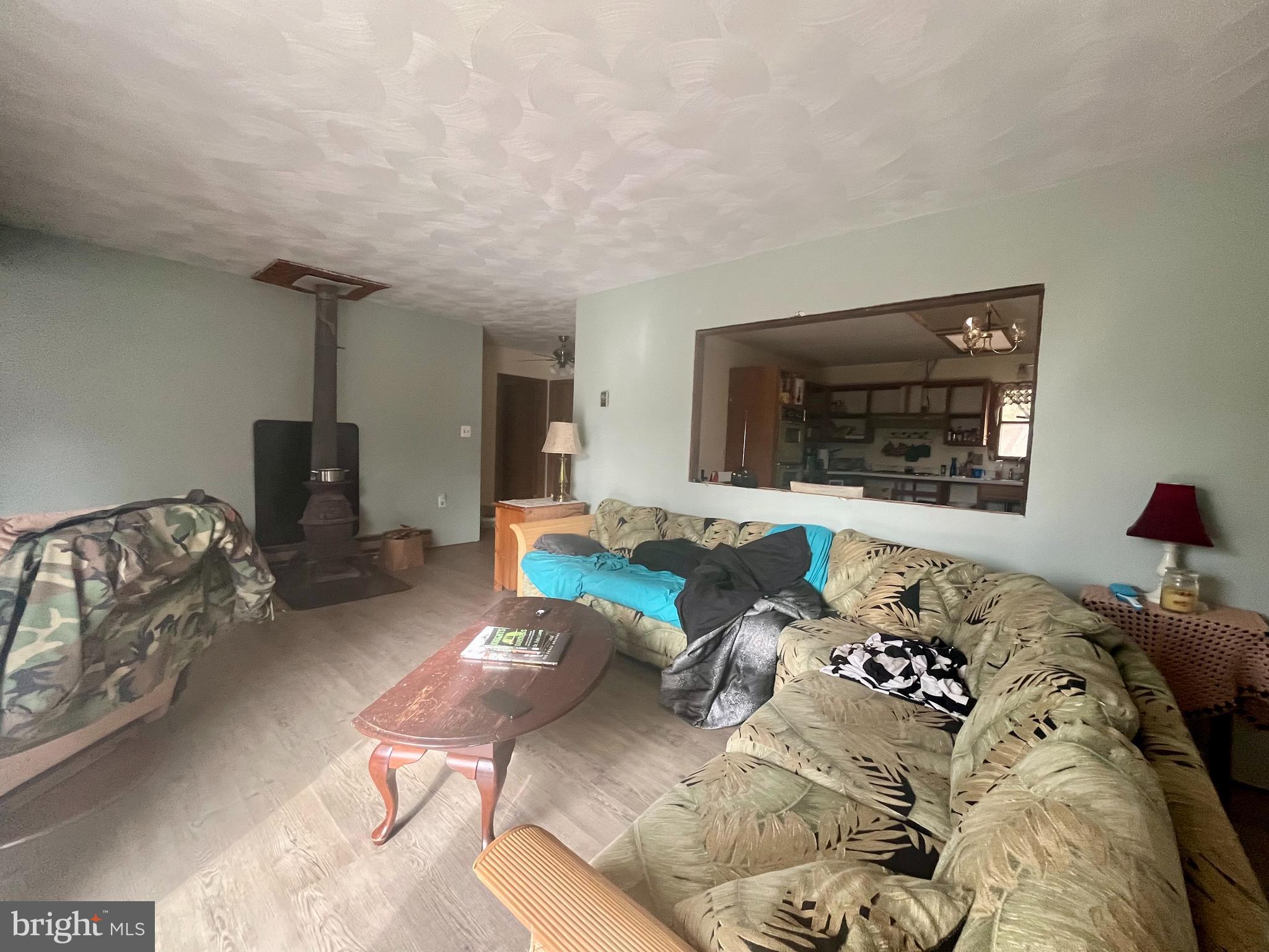 305 Rickard Place Rileyville, VA 22650 - Photo 4 of 27 a bedroom with furniture and a window