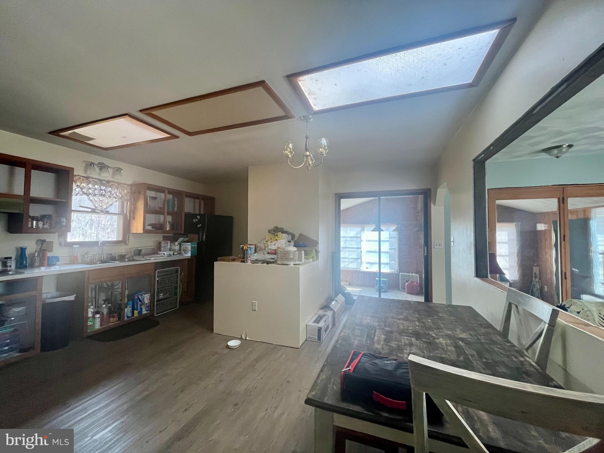 305 Rickard Place Rileyville, VA 22650 - Photo 9 of 27 a room with kitchen island granite countertop lots of counter top space and stainless steel appliances