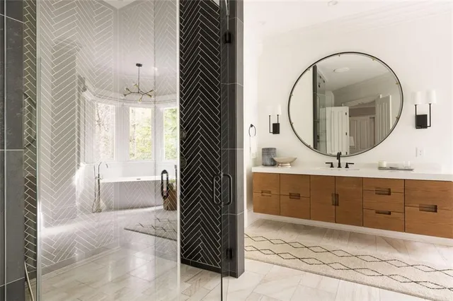 an aerial view of a house with yard swimming pool and outdoor seating