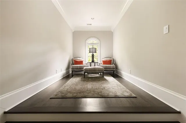 a view of a pathway both side of house