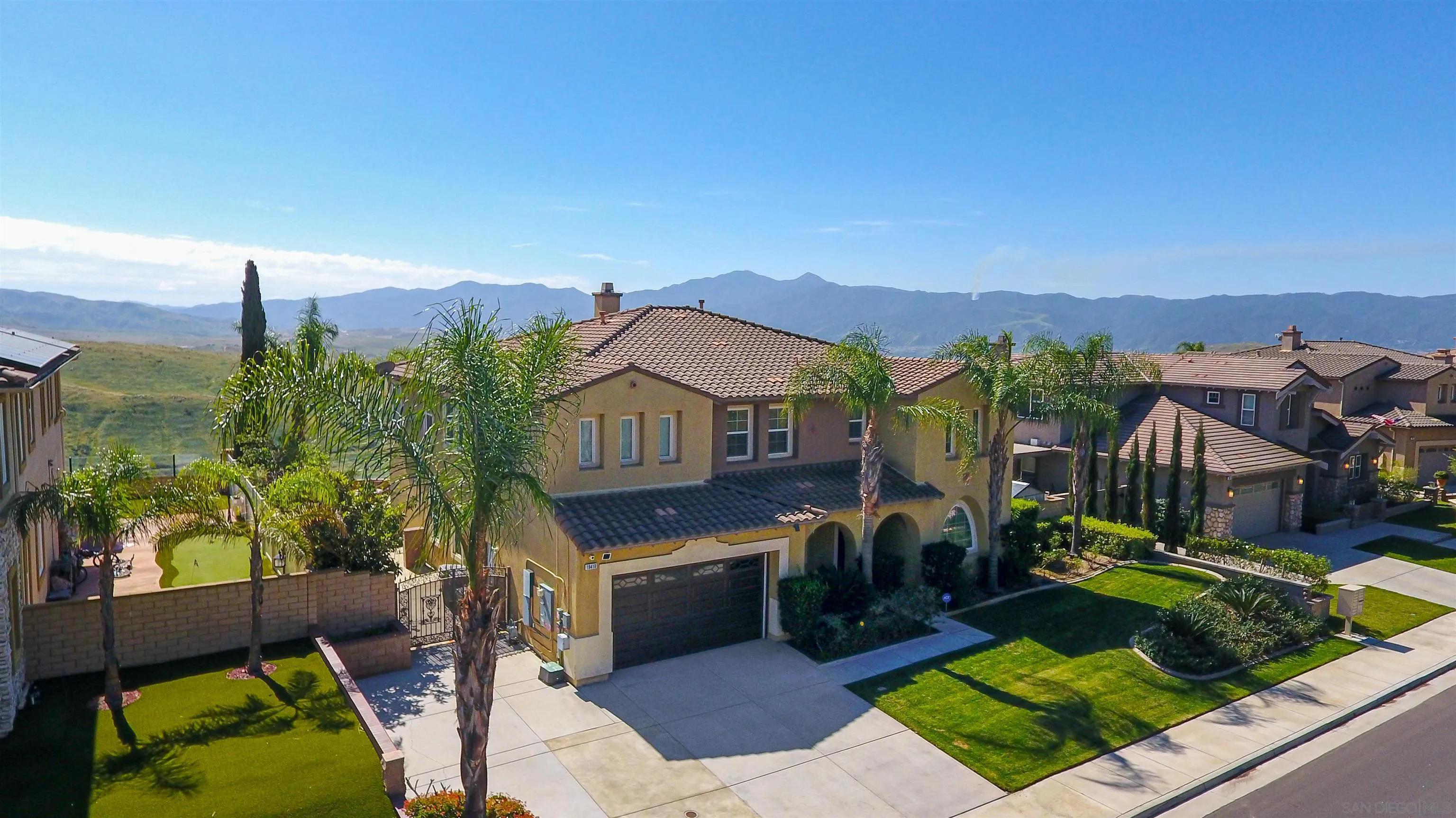 18410 Lakepointe Drive Riverside, CA 92503 - Photo 2 of 73 a front view of a house with a yard