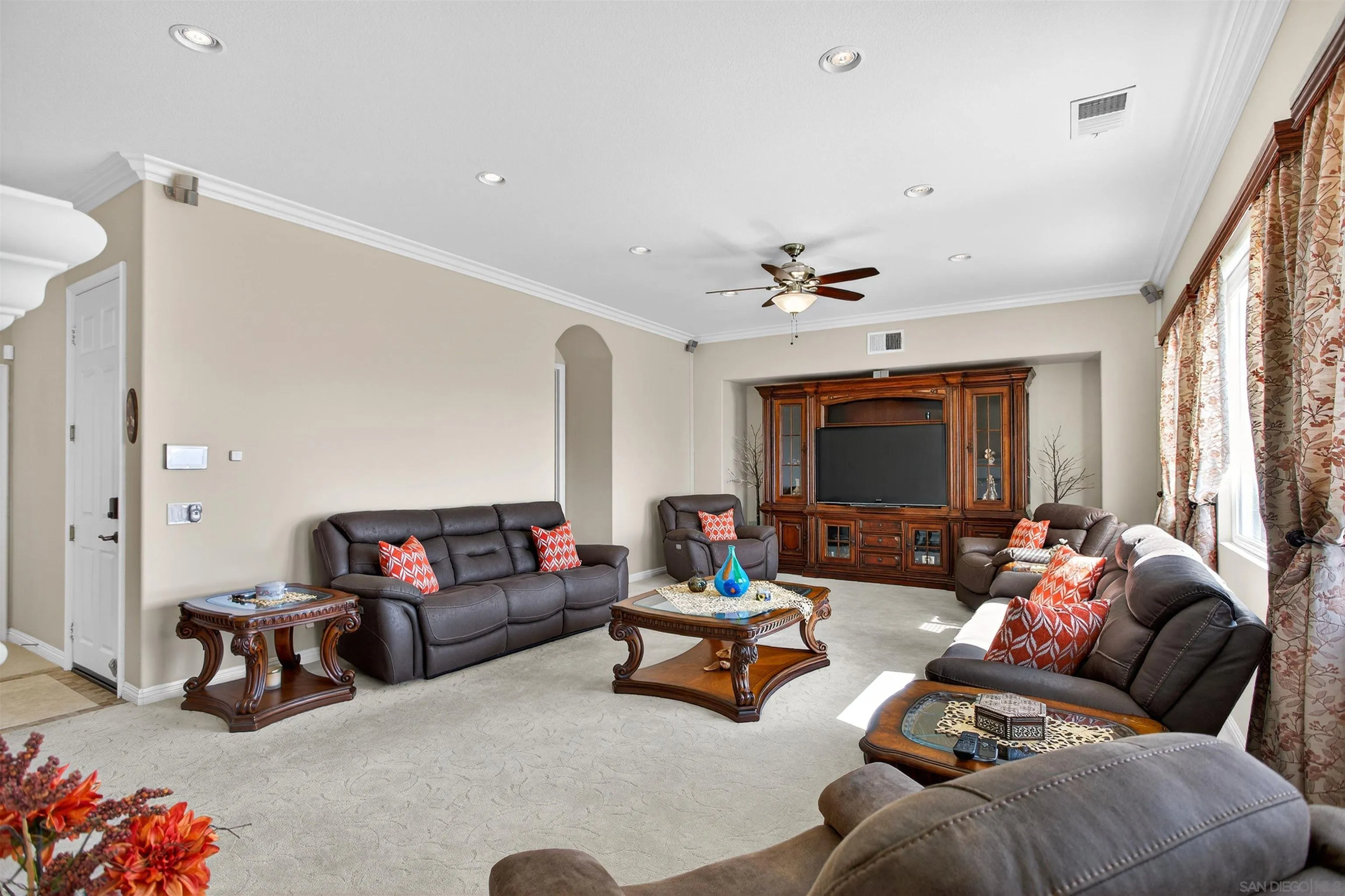 18410 Lakepointe Drive Riverside, CA 92503 - Photo 26 of 73 a living room with furniture and a flat screen tv