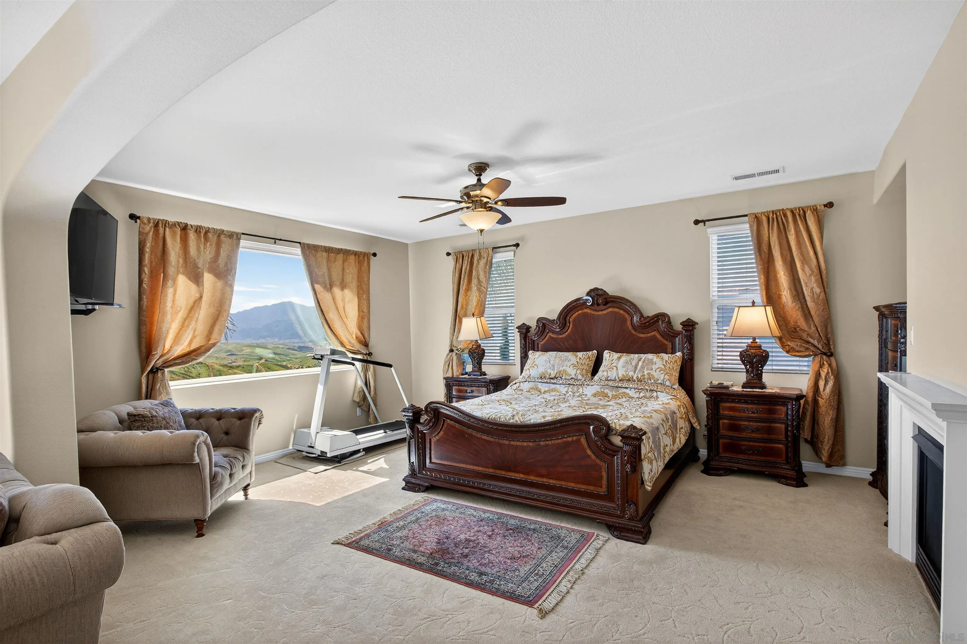 18410 Lakepointe Drive Riverside, CA 92503 - Photo 34 of 73 a spacious bedroom with a bed and a large window