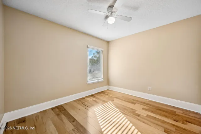 a view of a lake with a building in the background