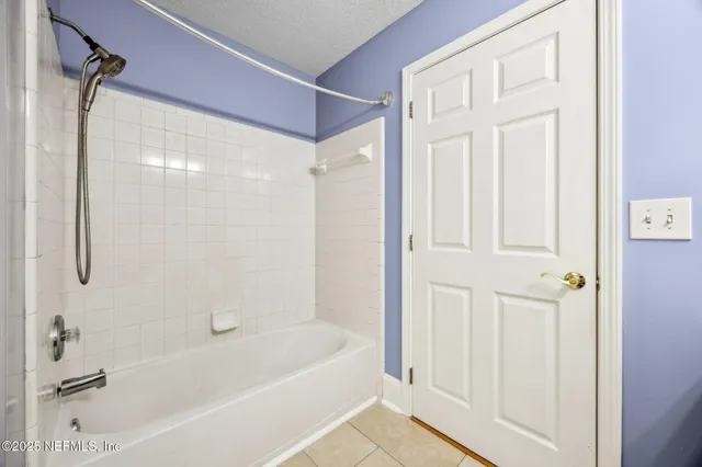 an aerial view of a house with a outdoor space