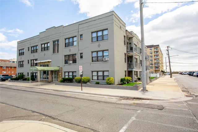 a view of a building with a street