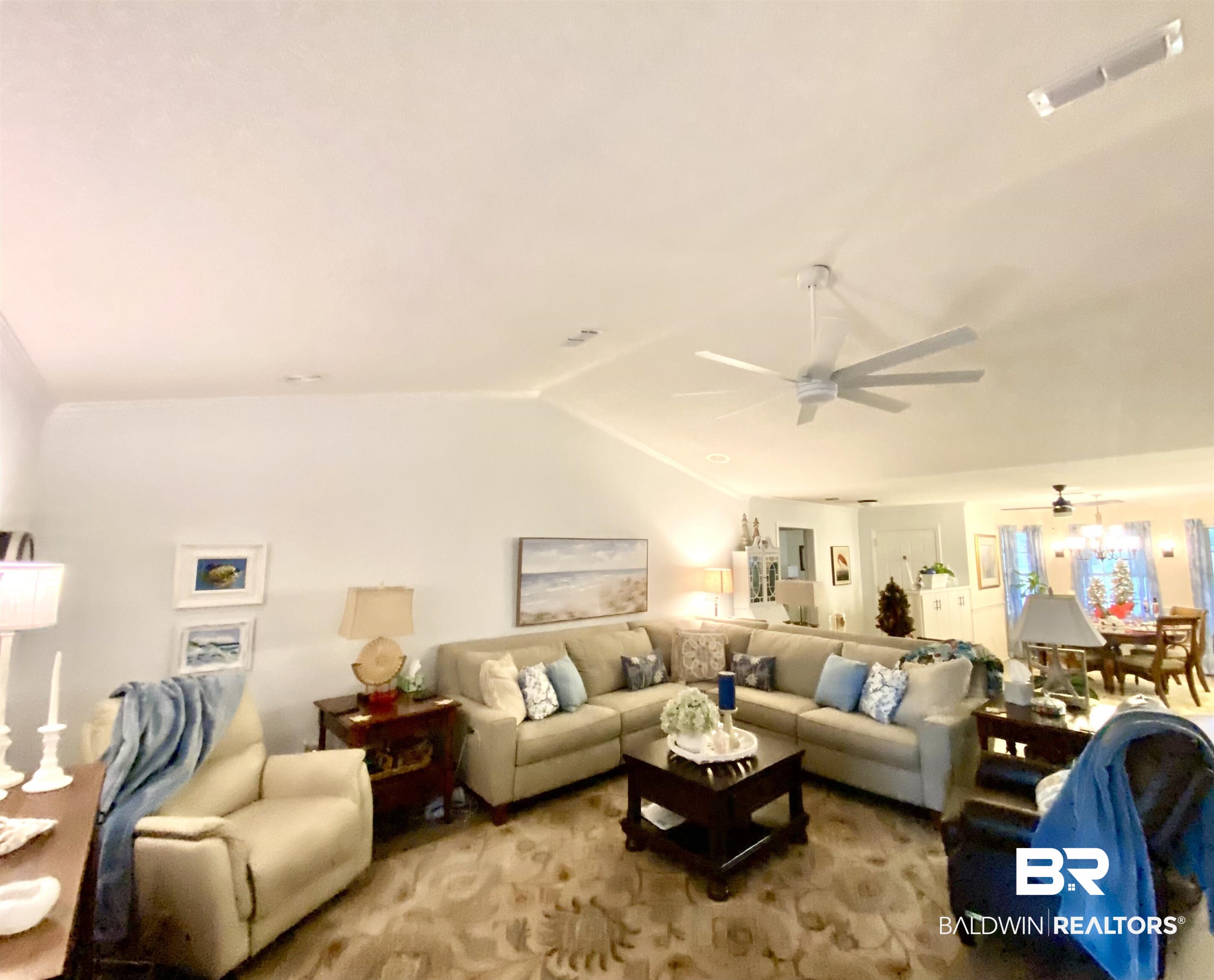 2872 Avenida Alberto Lillian, AL 36549 - Photo 16 of 31 Carpeted living room with lofted ceiling