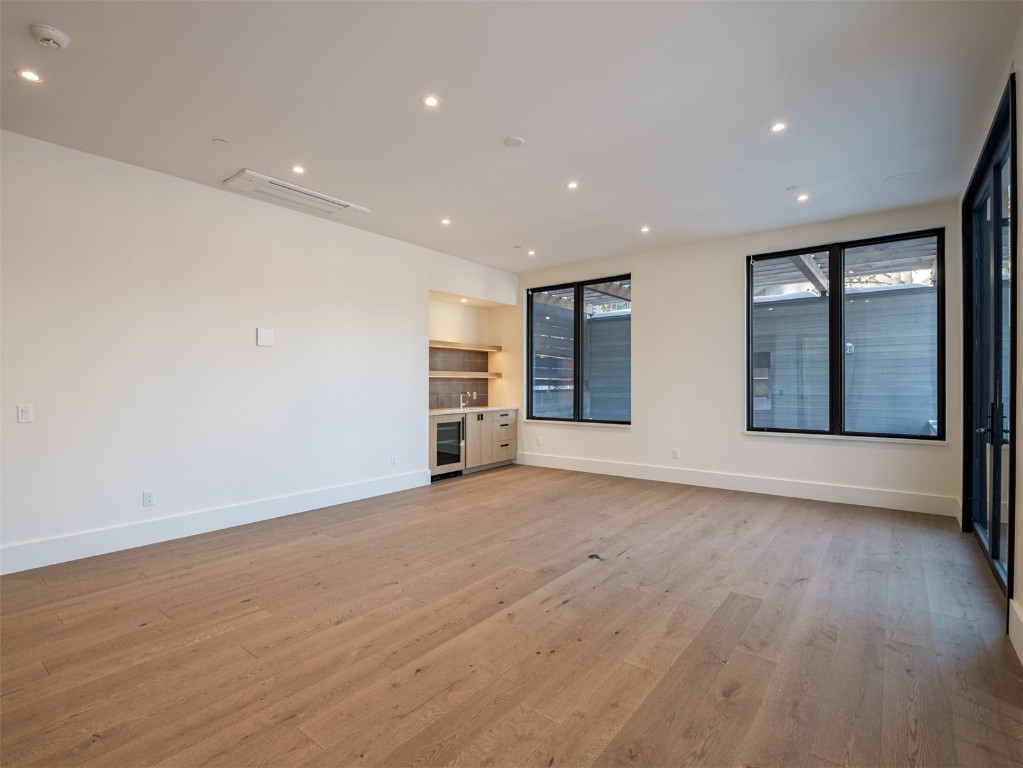 27 Boulder Circle Breckenridge, CO 80424 - Photo 29 of 42 an empty room with wooden floor and windows