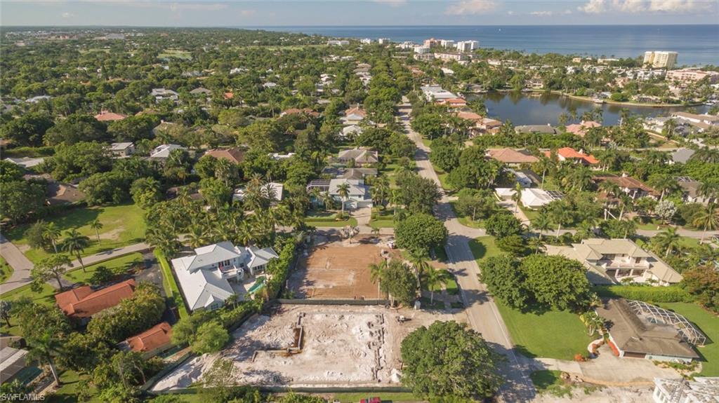 1952 Crayton Road Naples, FL 34102 - Photo 6 of 7 an aerial view of residential houses with outdoor space