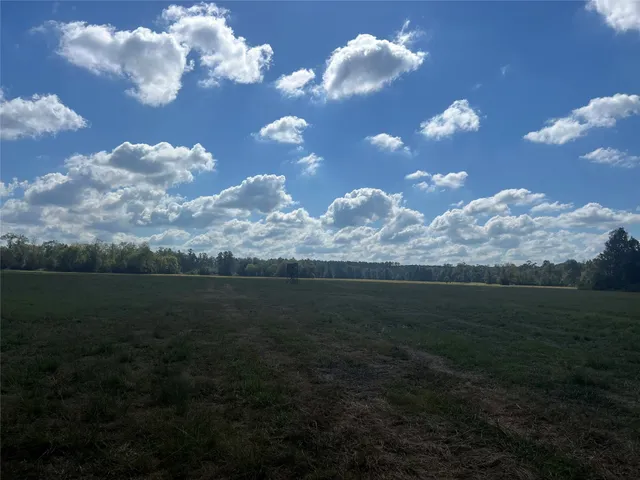 a view of a lake and sunset