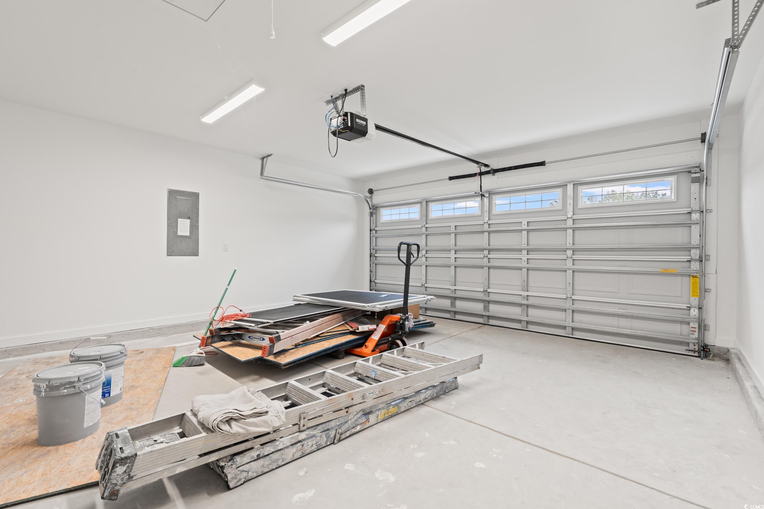 2827 Biscane Court Conway, SC 29527 - Photo 21 of 31 Garage featuring electric panel and a garage door opener
