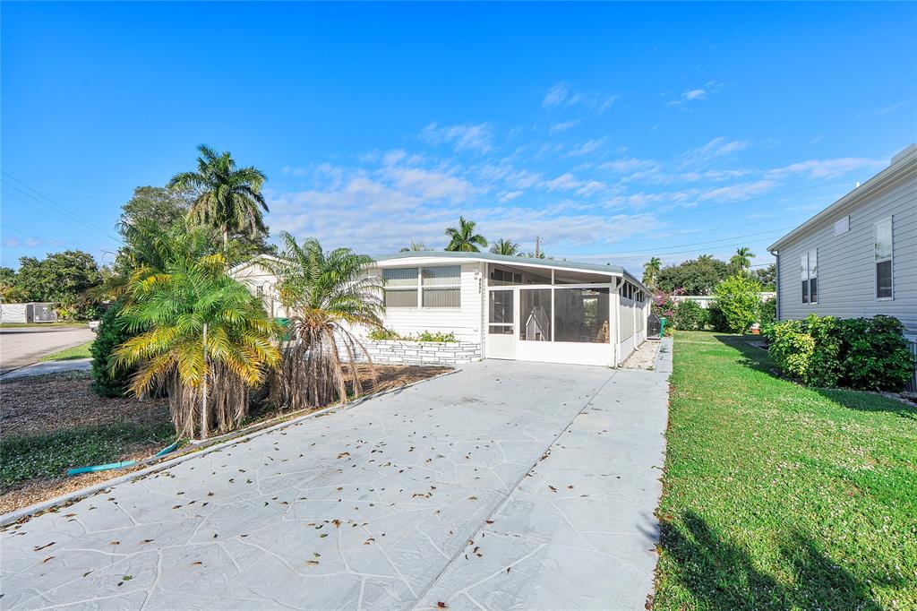 8631 Southwest 20th Street Davie, FL 33324 - Photo 13 of 21 a view of a house with a yard
