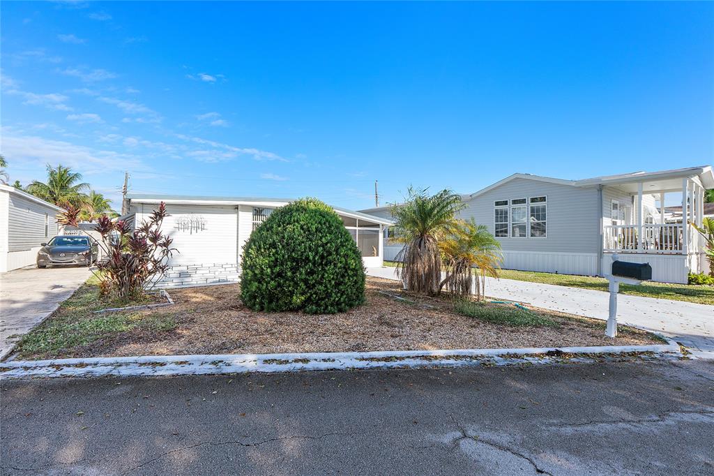 8631 Southwest 20th Street Davie, FL 33324 - Photo 14 of 21 a house view with a outdoor space