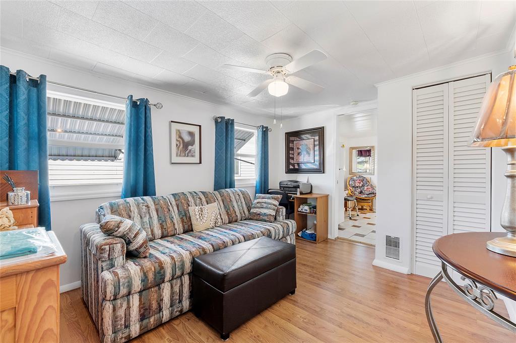8631 Southwest 20th Street Davie, FL 33324 - Photo 3 of 21 a living room with furniture and a window