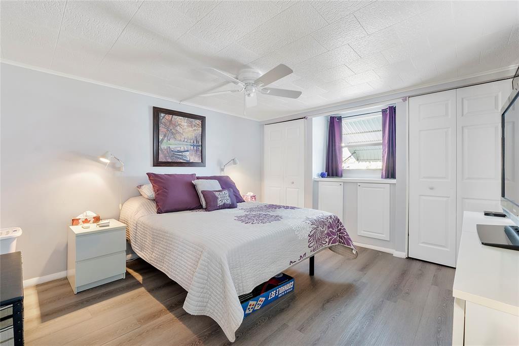 8631 Southwest 20th Street Davie, FL 33324 - Photo 9 of 21 a bedroom with a bed and window