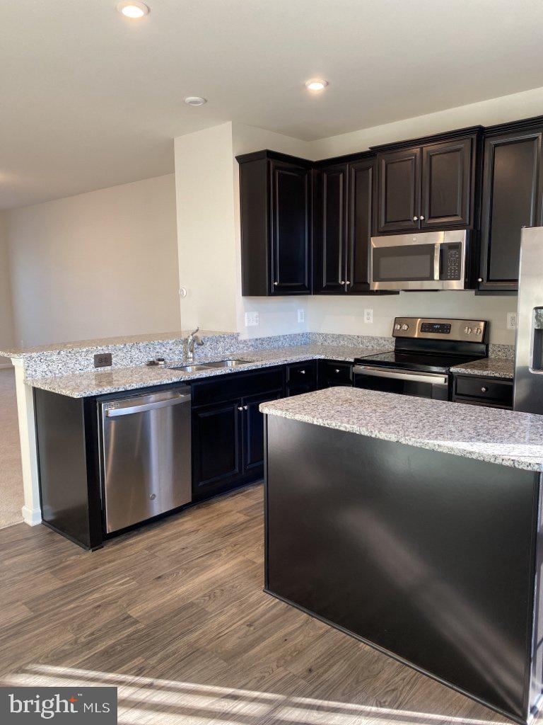 531 View Point Way Fredericksburg, VA 22405 - Photo 24 of 36 Sleek modern kitchen with granite accents.