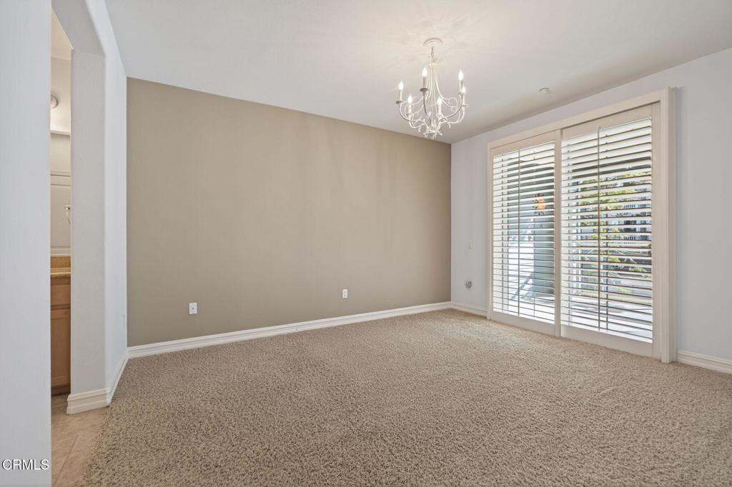 1423 Windshore Way Oxnard, CA 93035 - Photo 43 of 77 a view of an empty room with a window