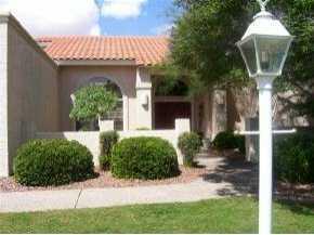 11905 Paseo Del Rio El Paso, TX 79936 - Photo 1 of 1 a front view of a house with garden