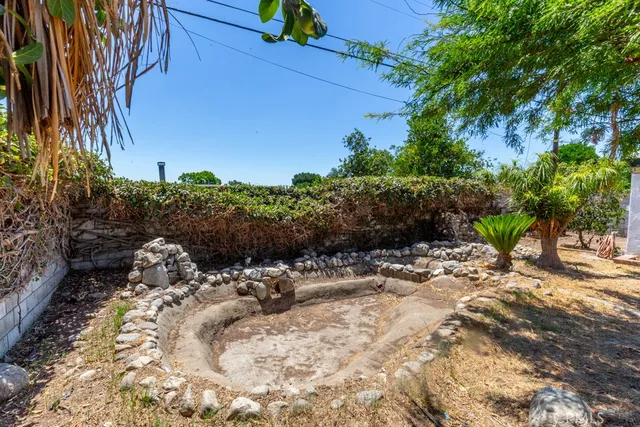 a view of a backyard of a house