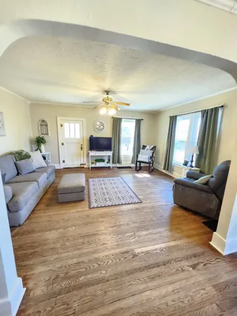 a kitchen with a stove a sink and a refrigerator