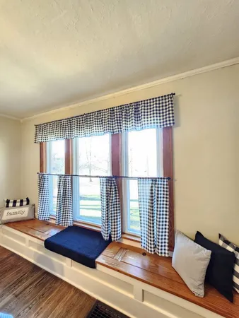 a kitchen with a stove and a refrigerator