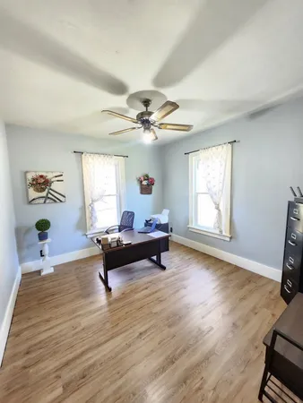a kitchen with a stove a sink and a refrigerator