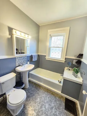 a living room with a couch and a table