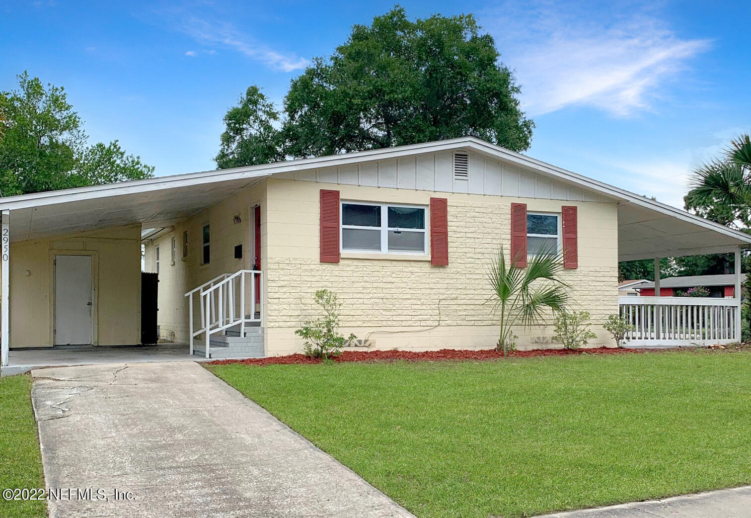 2950 Mansion Road Jacksonville, FL 32277 - Photo 1 of 30 a front view of house with yard and green space
