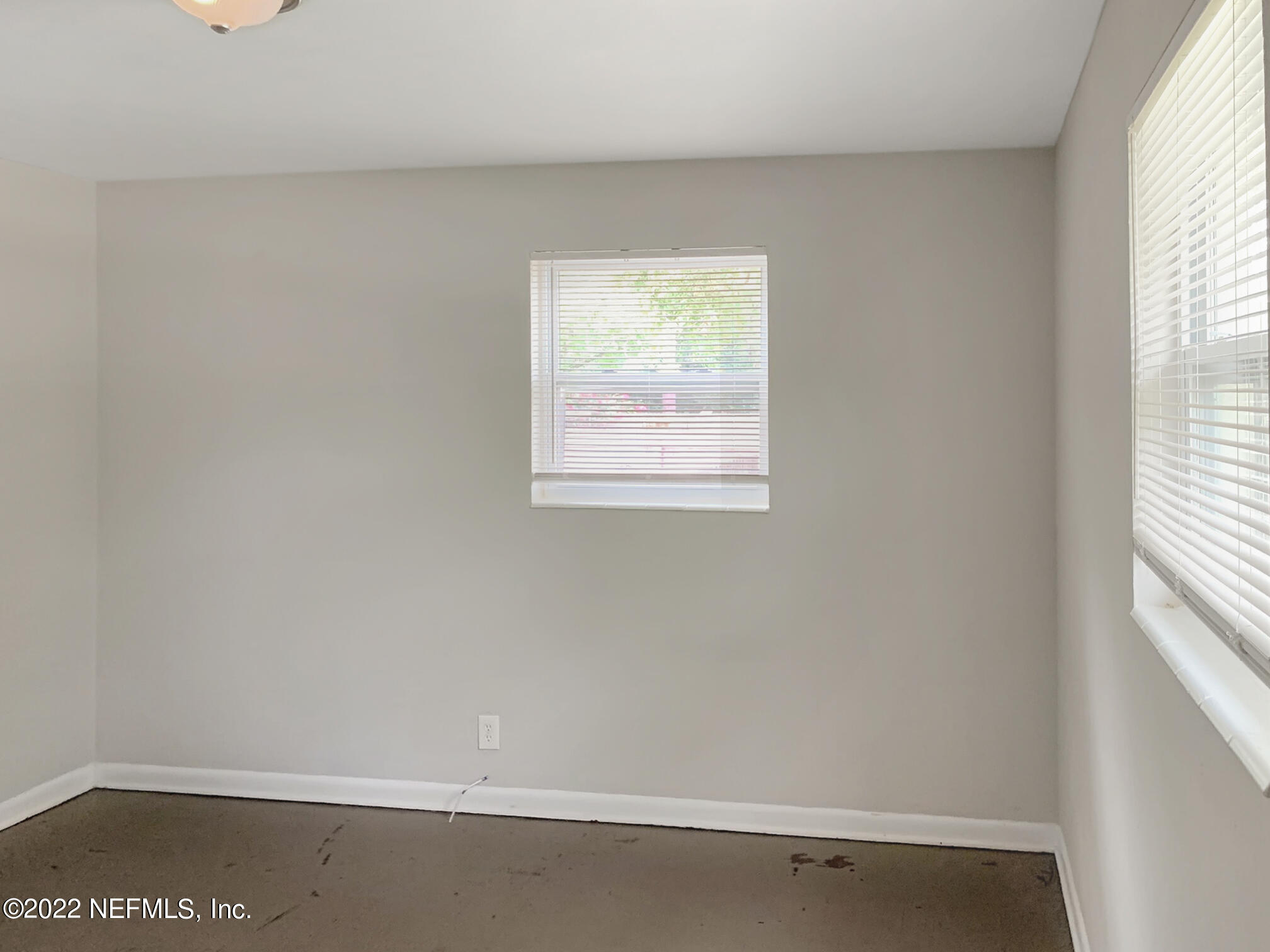 2950 Mansion Road Jacksonville, FL 32277 - Photo 26 of 30 an empty room with a window