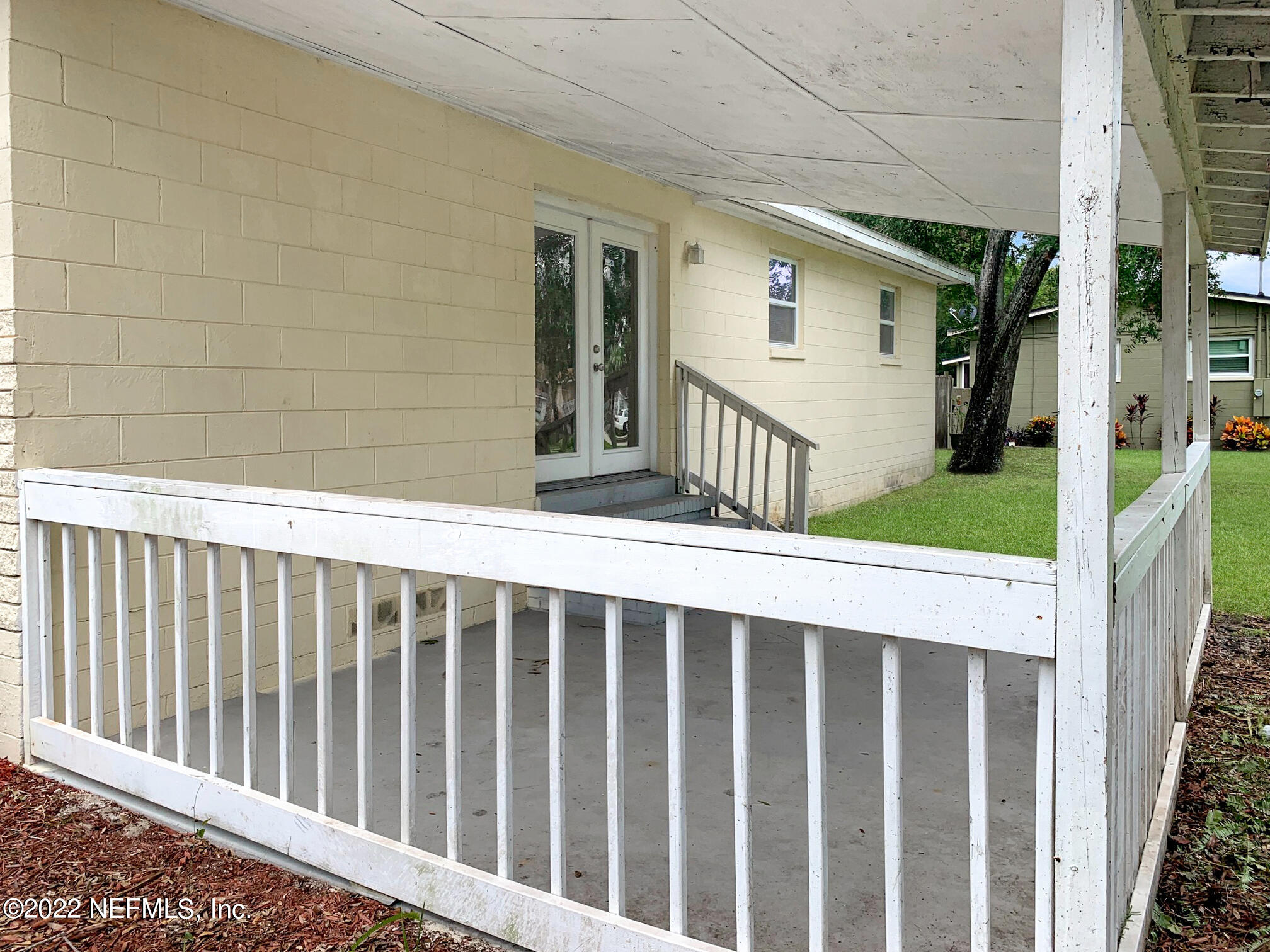 2950 Mansion Road Jacksonville, FL 32277 - Photo 6 of 30 a view of a wooden fence
