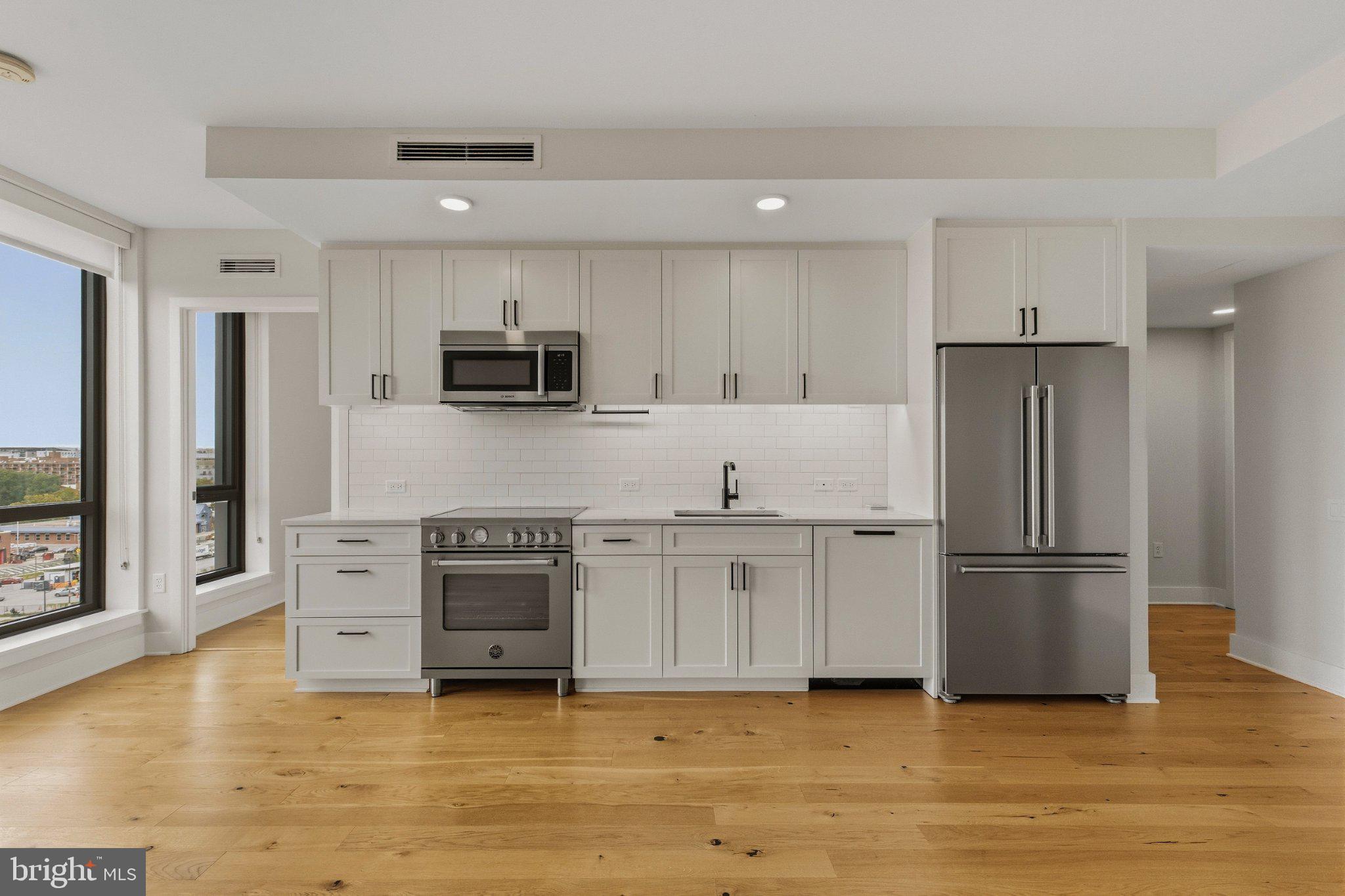 1211 Van Street Southeast, Unit 818 Washington, DC 20003 - Photo 7 of 39 Luxurious kitchen with high-end appliances